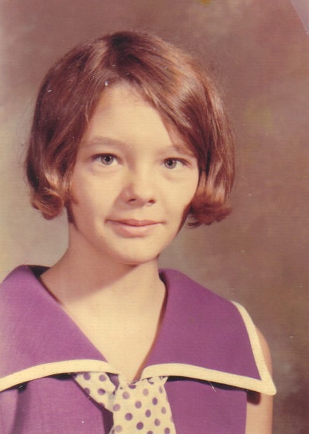 A school portrait of Rebecca as a girl